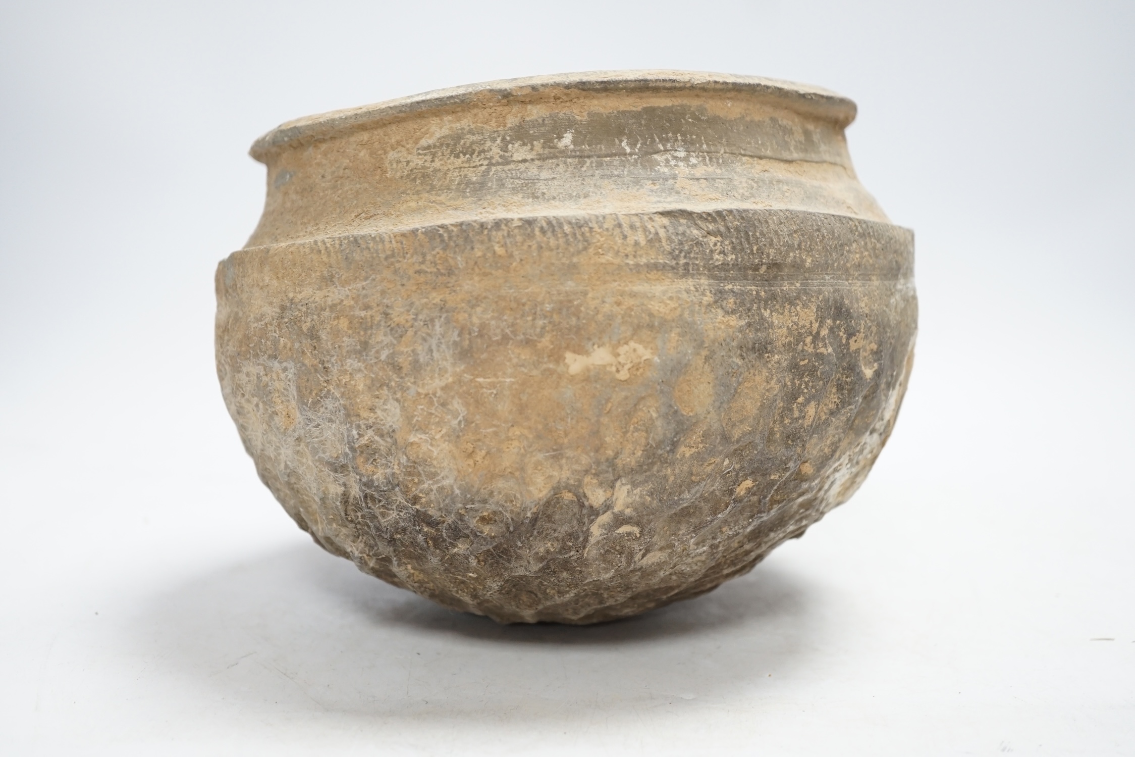 A Chinese grey pottery bowl, probably Warring States, 19cm diameter